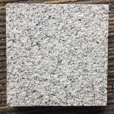 芝麻白花岗岩烧面与荔枝面干挂工艺详解